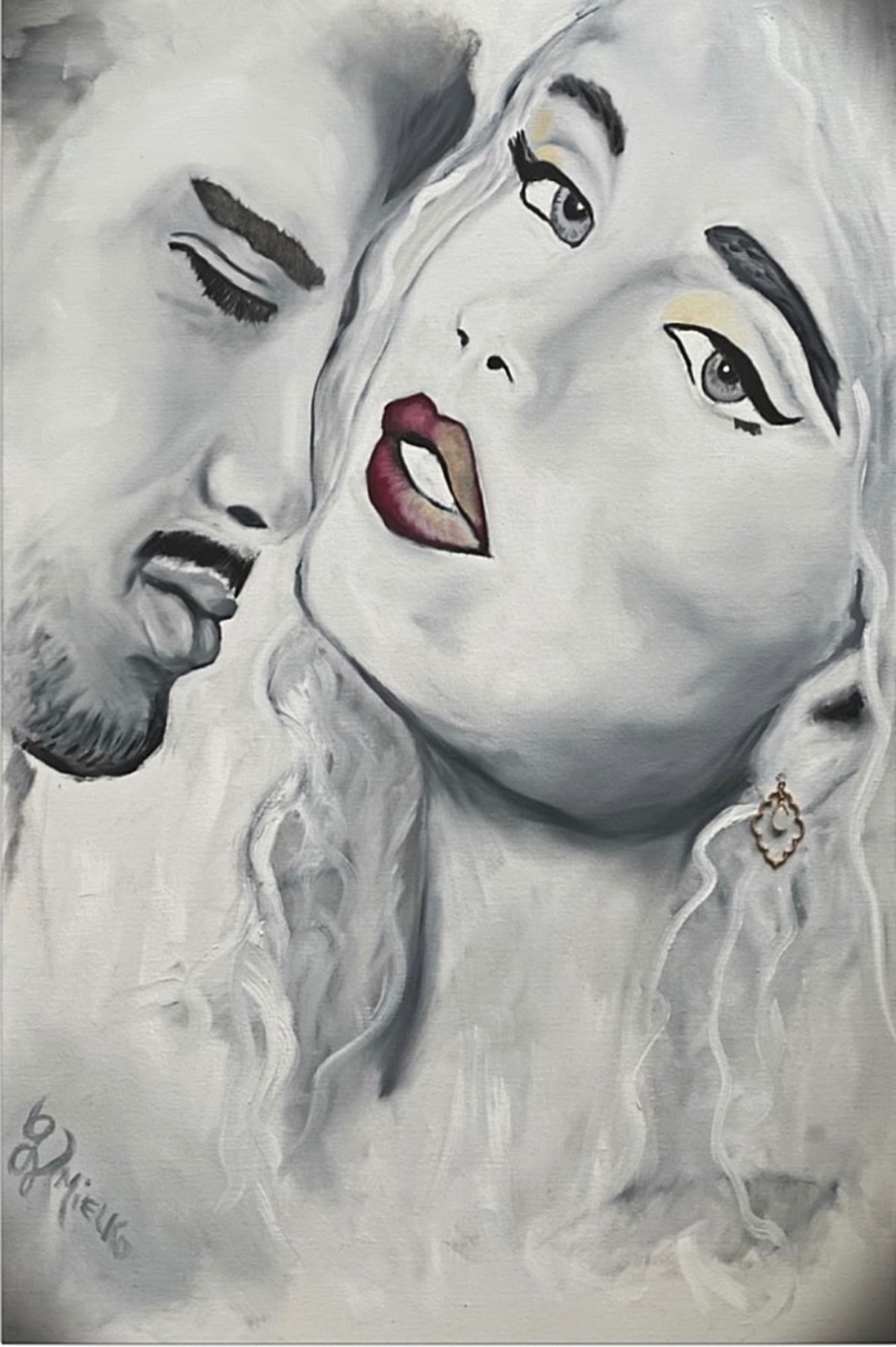 Stylized painting of two intimate faces. One bearded man with closed eyes and serene expression, and one woman with flowing hair, bold red lips, winged eyeliner, and a prominent earring. Monochromatic palette with selective color accents evokes themes of longing, connection, and emotional duality. Signed “GV Mielko.”this contemporary figurative artwork appeals to collectors of romantic portraiture, emotionally charged mixed-media, and modern symbolic art. Ideal for curators seeking narrative-driven works that explore intimacy, contrast, and the complexity of human connection through expressive visual storytelling.